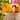 Vaso Alto con Uccellino in Vetro Bordo Lavorato Colore Arancione h 27 cm