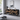 Credenza moderna nera con inserti geometrici in legno naturale e struttura in metallo