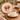 Set 2 tazze da caffè in gres color crema con piattini decorati con mongolfiere vintage.