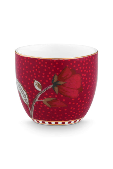 Bicchierino Pip Studio rosso decorato con fiore e rametto
