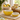 Coppa in ceramica a forma di limone con coperchio in ambiente cucina luminoso con decorazioni coordinate e atmosfera estiva