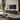 Mobile TV moderno nero opaco con linee arrotondate e design minimal contemporaneo